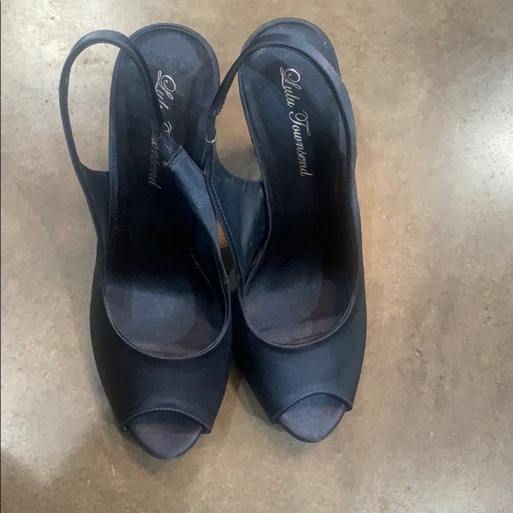 Brand new Satin high heels never worn